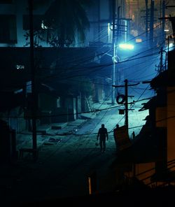 Illuminated buildings in city at night