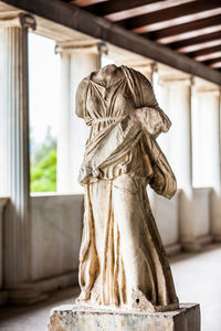 Statue of a young woman probably artemis at the stoa of attalos in athens
