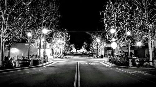 Illuminated street lights at night