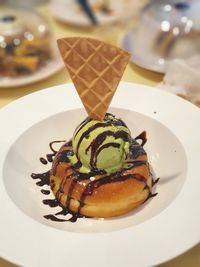 Close-up of ice cream in plate on table