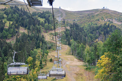 Lifts of the mountain cable car on the background of mountains