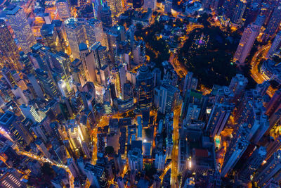 High angle view of illuminated buildings at night