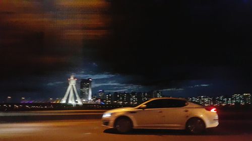 Illuminated cityscape at night