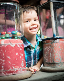 Portrait of smiling boy with candy