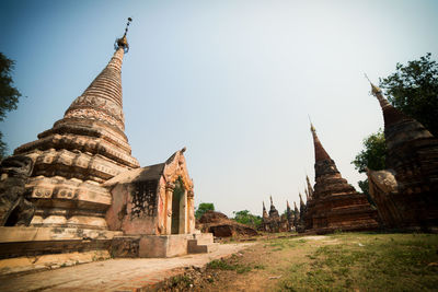 Old temple building against clear sky