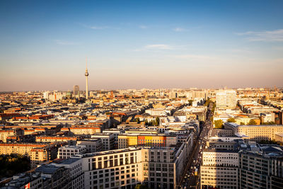 High angle view of city buildings during sunset