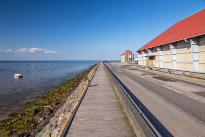 Scenic view of sea against blue sky