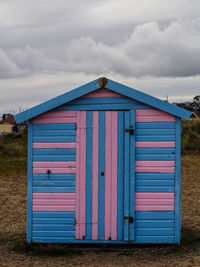 Pink and blue wooden beach hut great yarmouth close up details