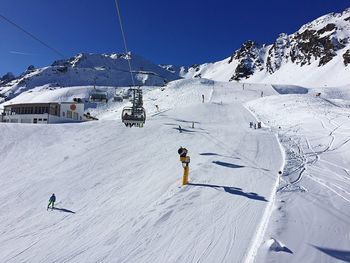 View of people skiing in snow