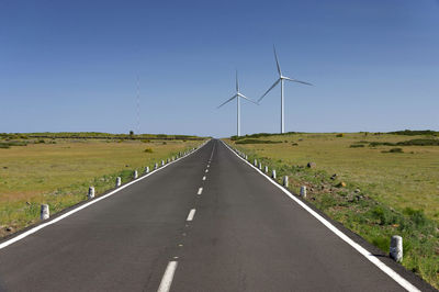 Wind turbines along countryside road