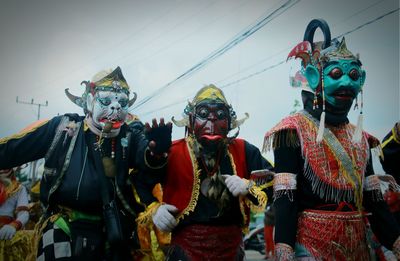 People dressed as monsters during festival