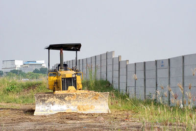 Construction site on field against clear sky