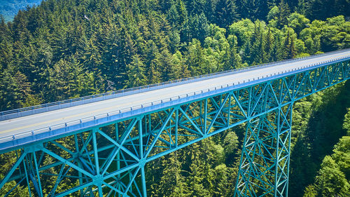 High angle view of bridge against trees