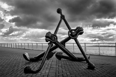 Close-up of railing against sea