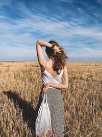 Woman standing in a field