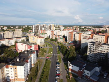 High angle view of buildings in city against sky