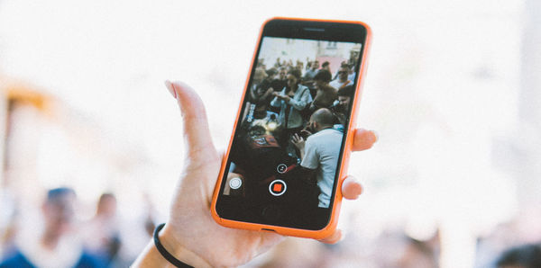 Close-up of hand holding smart phone