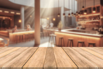Close-up of wooden table at restaurant