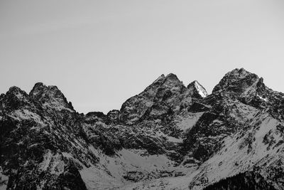 Low angle view of mountains against clear sky