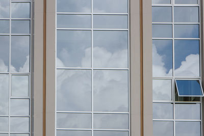 Reflection of sky in glass building