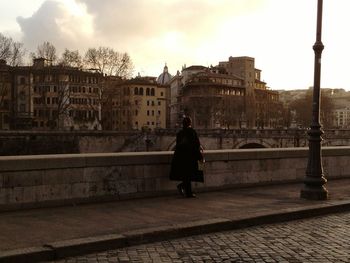 Woman walking on city street