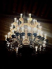 Low angle view of illuminated chandelier