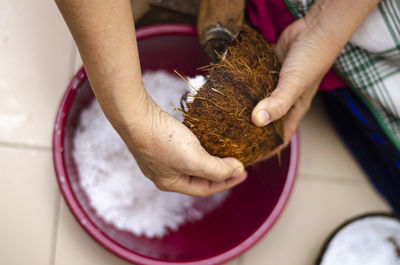 High angle view of person preparing food on table