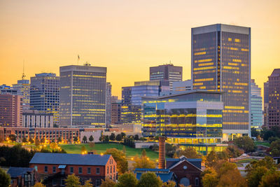 Buildings in city at night