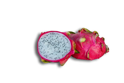 Close-up of pink petals on white background