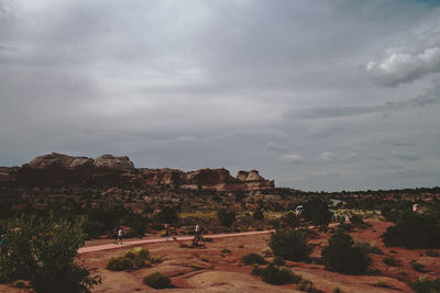 Built structure on landscape against sky