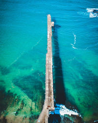 Aerial view of pier over sea