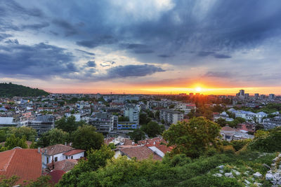 High angle view of townscape against sky at sunset