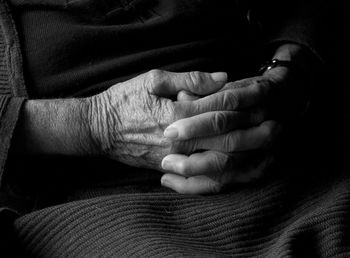 Close-up of woman hand on finger