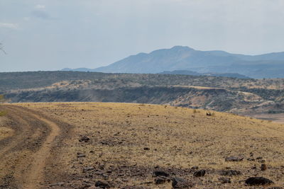 Scenic view of desert against sky