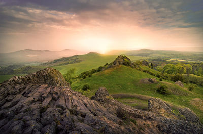 Scenic view of landscape against sky during sunset