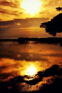 Scenic view of sea at sunset