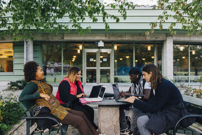 Young male and female student studying in campus