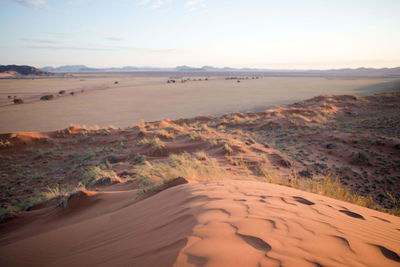 Scenic view of desert against sky