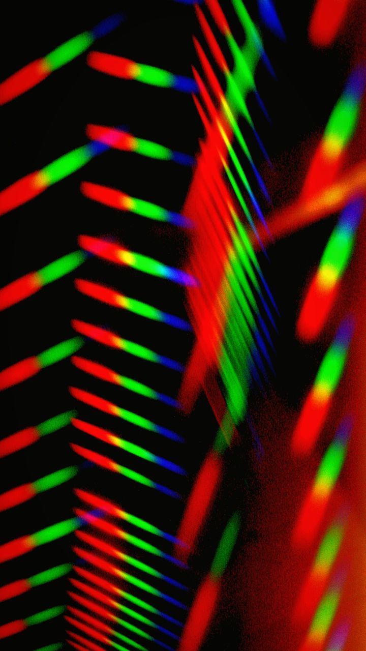 DEFOCUSED IMAGE OF ILLUMINATED LIGHTS