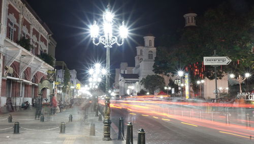 Light trails on city street at night