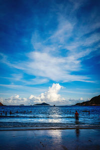 Scenic view of sea against blue sky