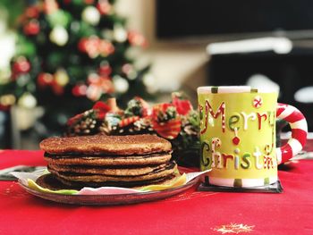 Close-up of cake and coffee served on table