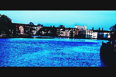 View of river with buildings in background