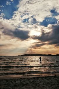 Scenic view of sea at sunset