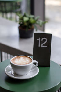 Coffee cup on table