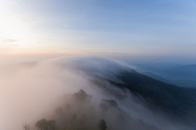 Scenic view of mountains against sky during sunset