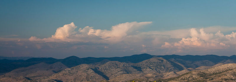 Panoramic view of mountains against sky during sunset