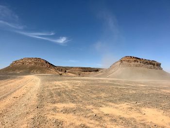 Scenic view of desert against sky