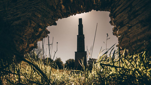 Low angle view of tower against sky