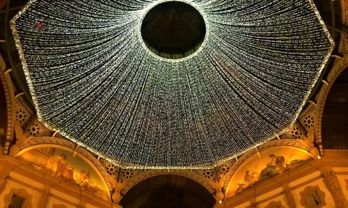 Low angle view of illuminated ceiling